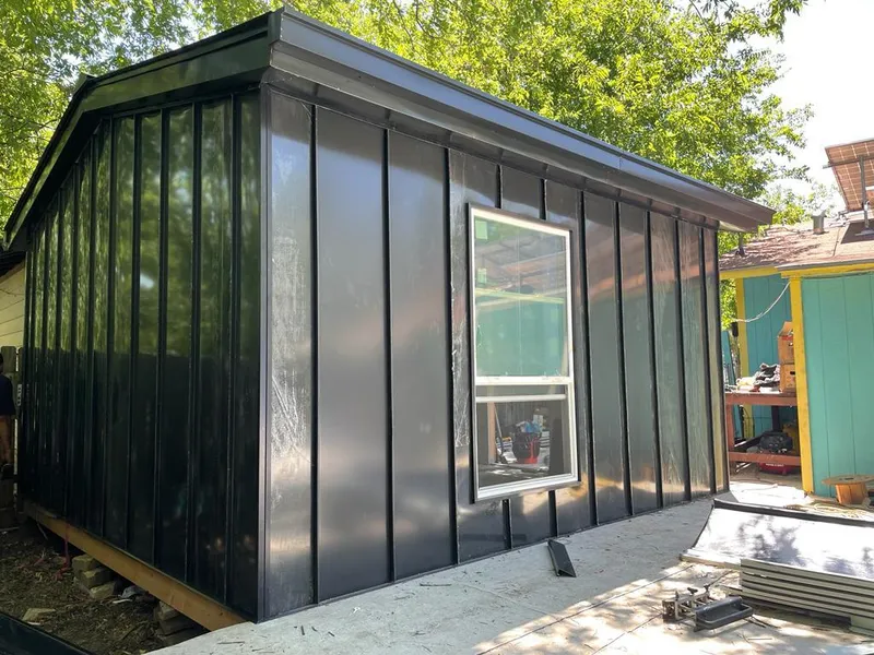 Black standing seam metal wall panels for Roof Inspection in Palm City